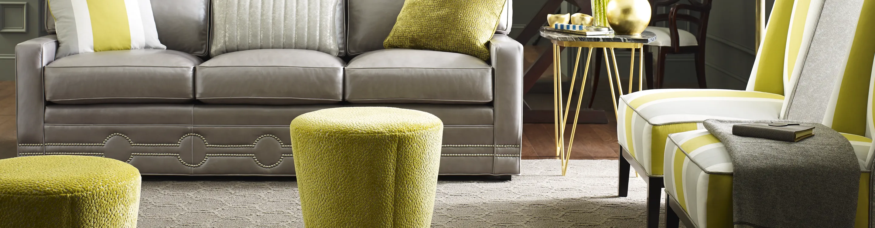 Cream area rug in a living room with lime green accents
