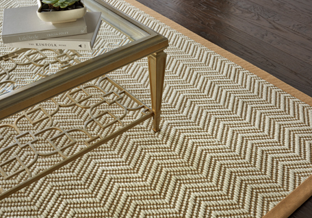 Neutral pattern area rug under coffee table 