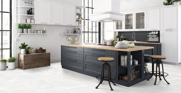 Durable porcelain floor tile in a modern rustic kitchen with large navy blue center island